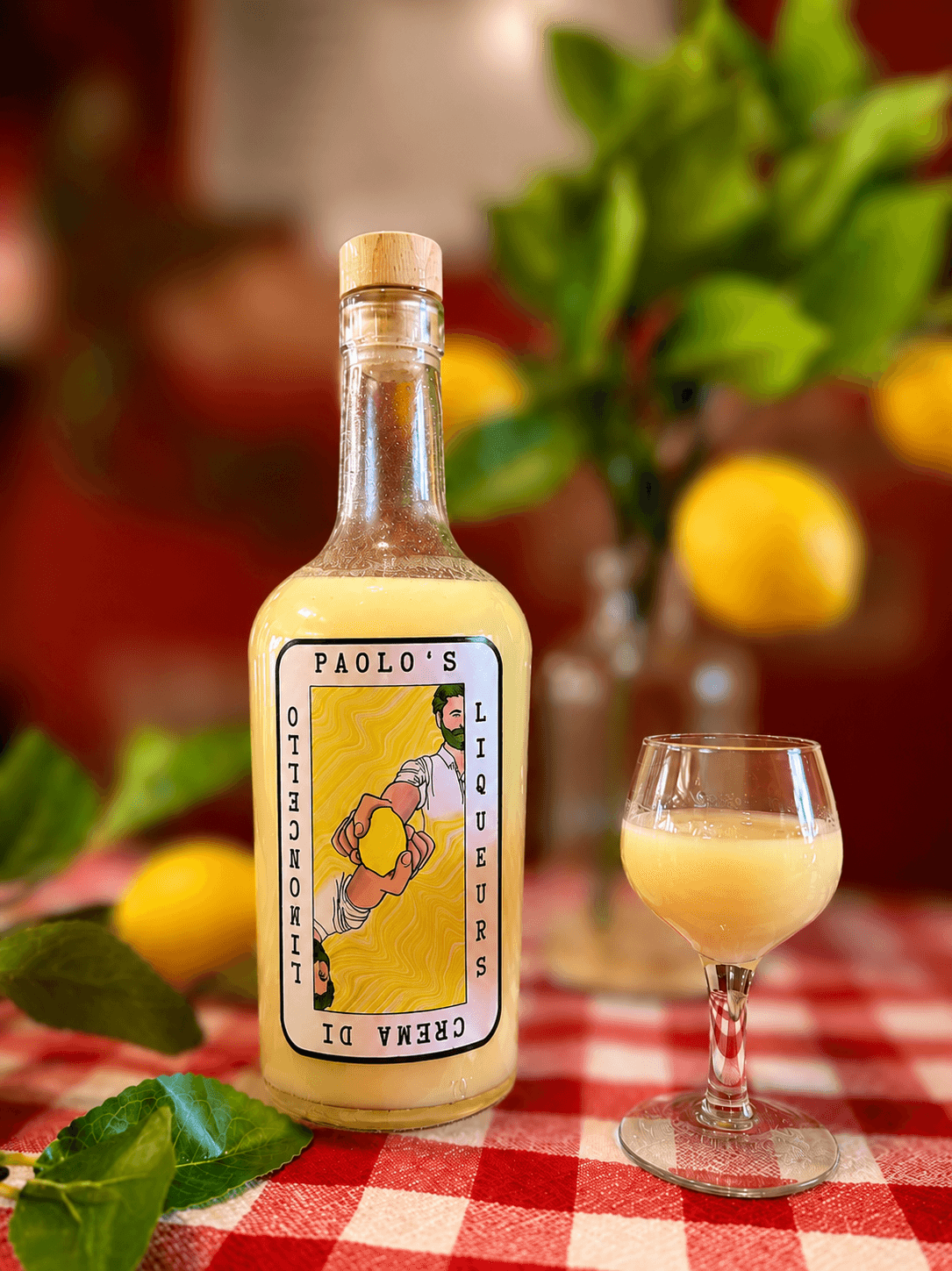 Paolo's Crema Di Limoncello bottle on a chequered tablecloth